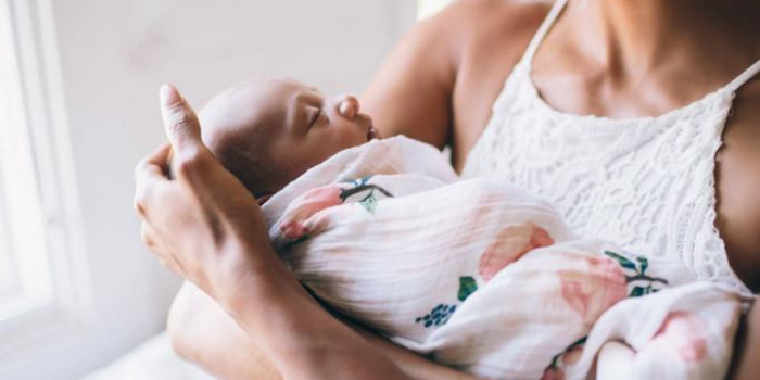 Woman holding baby
