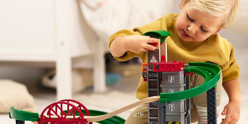 Little Boy Playing With BRIO World Toy