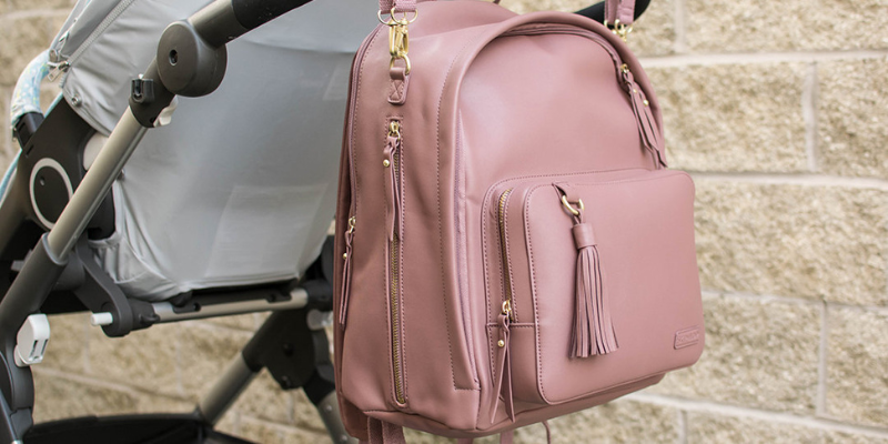 Diaper backpack hanging off stroller