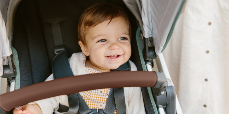 Baby Smiling While Sitting in UPPAbaby Vista V2 Stroller 