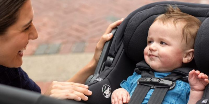 Baby Smiling While Sitting in UPPAbaby Mesa V2 Infant Seat