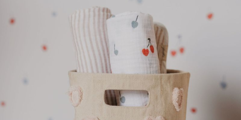 Pehr Designs Pom Pom Storage Bin with Blankets Inside