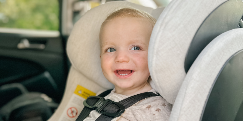 Baby Smiling While Sitting in Clek Fllo Car Seat