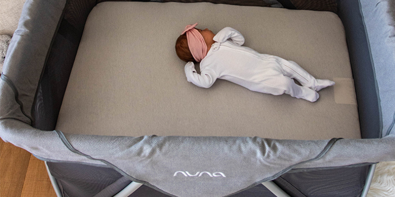 newborn baby laying in the Nuna Sena Aire
