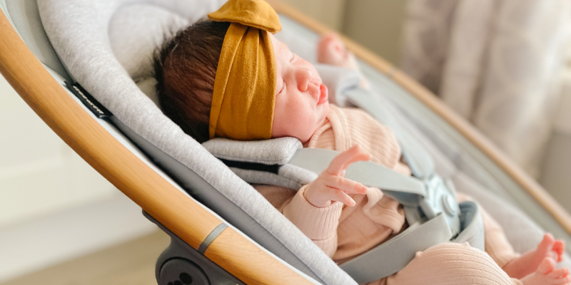 Baby laying in Maxi-Cosi Cassia Swing