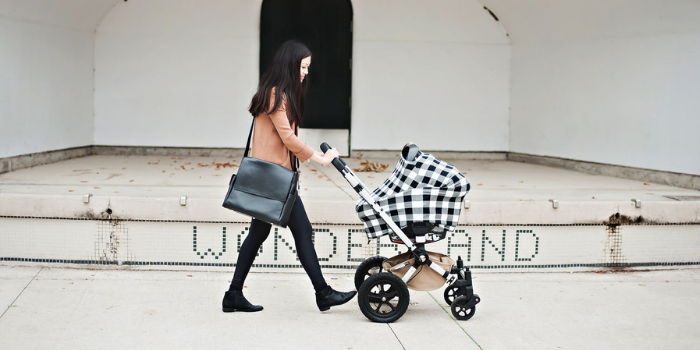 Mom walking with baby in a stroller