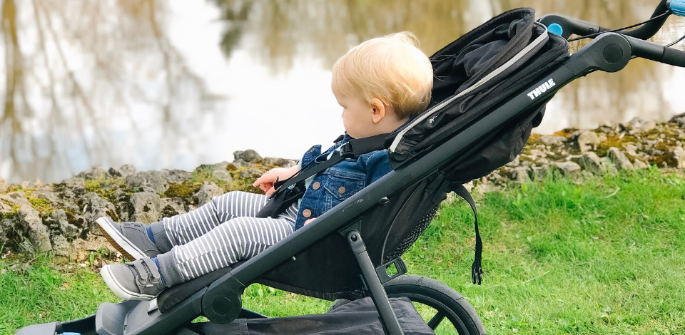 Thule Urban Glide 2 Side-Vie With Baby Sitting Inside