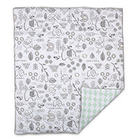 Grey and white patterned quilt