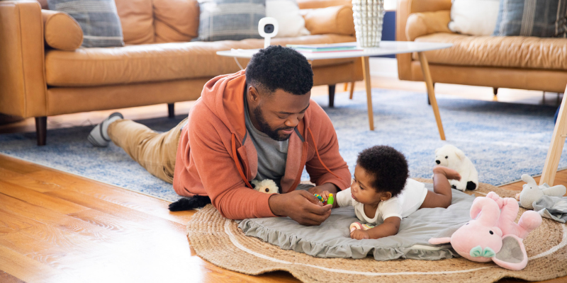 Dad playing with child