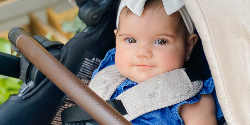 Baby girl in Baby Jogger Stroller