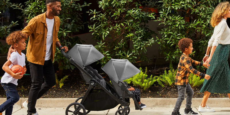 Family strolling with the Baby Jogger City Select 2 Stroller