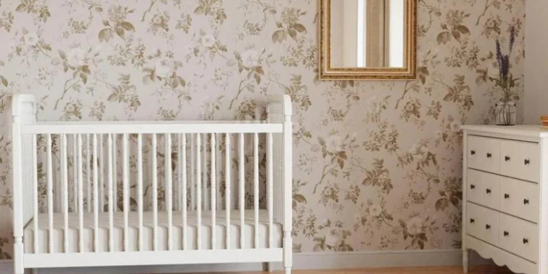 Nursery with white crib and dresser