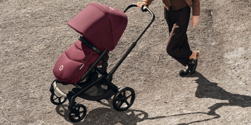 Women pushing Bugaboo Fox 5 Renew Stroller on dirt path
