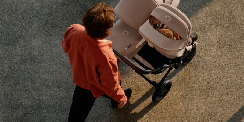 Dad pushing Bugaboo Donkey 5 Stroller