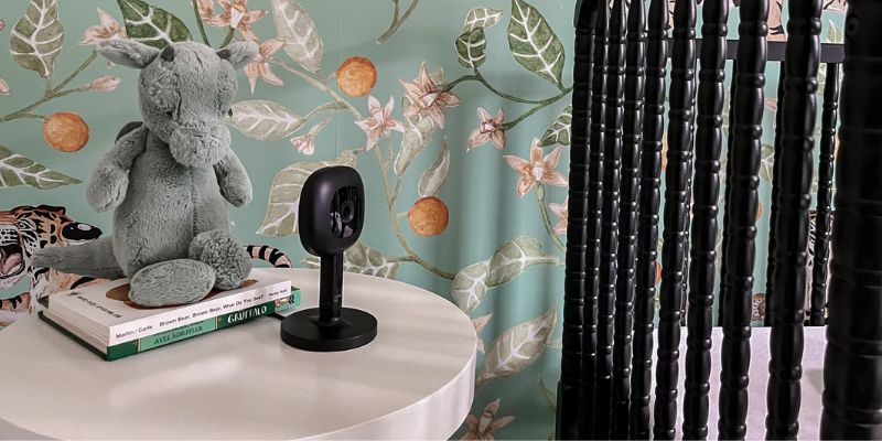 Nanit pPro Smart Camera Baby Monitor on Side Table in Nursery