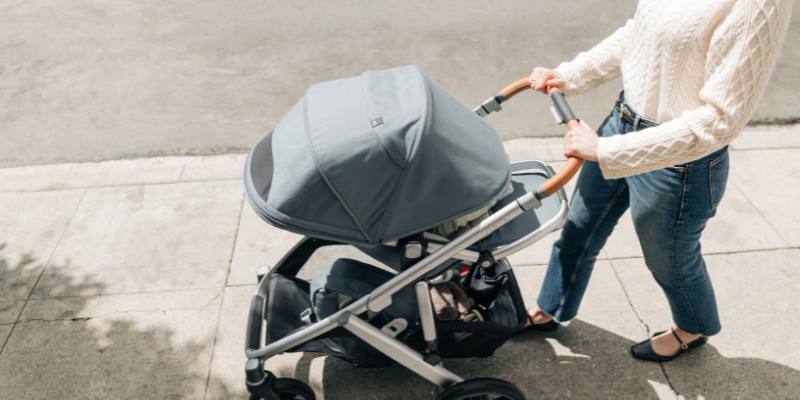 Parent pushing UPPAbaby Vista V3 Stroller]