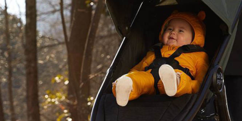 Baby in snowsuit sitting in Baby Jogger City Mini GT2 Stroller