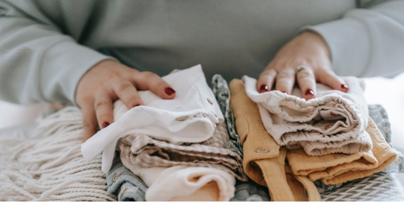 Woman folding clothes 