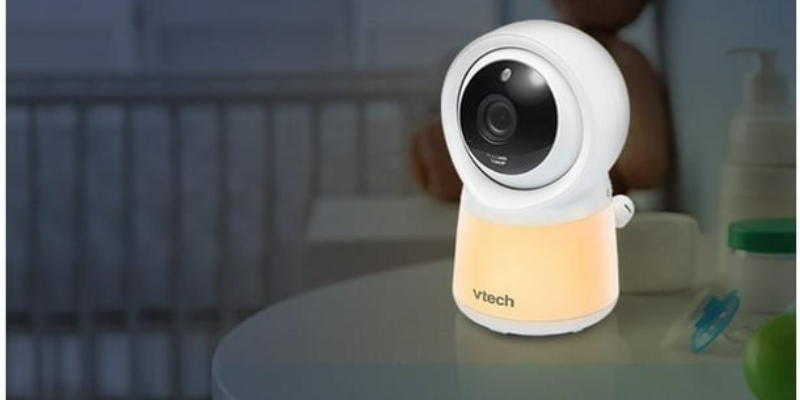 Vtech 5" Smart Wi-Fi 1080 Video Monitor Sitting in Table With Nightlight On