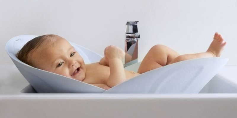 Baby Smiling While in bathing in sink with insert