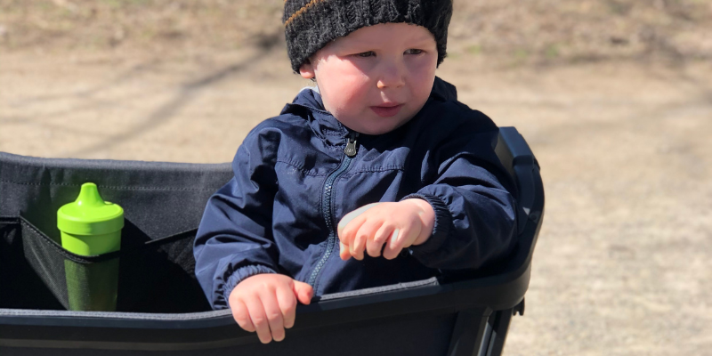 Little Boy Sitting in Veer Cruiser 