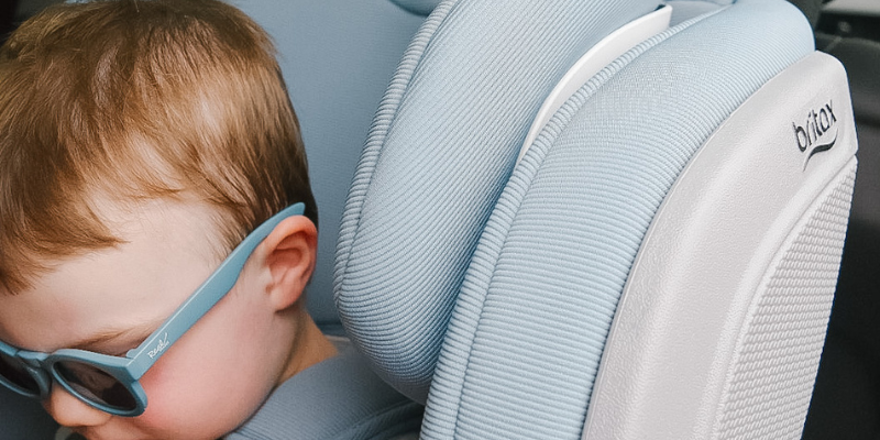 Little boy sitting in a Britax car seat
