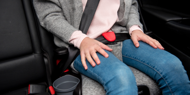 Older child sitting in a Britax Grow With You Click Tight Booster Car Seat