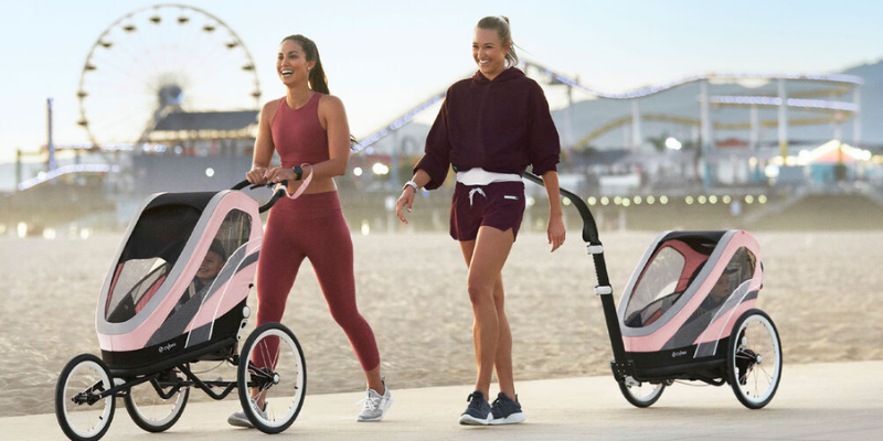 2 moms jogging with the Cybex Zeno Sport Bike Trailer