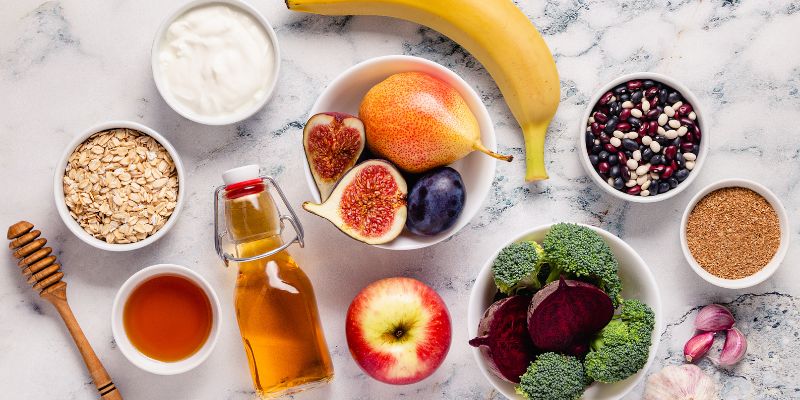 Birds eye view of countertop with a variety of fruits and vegetables