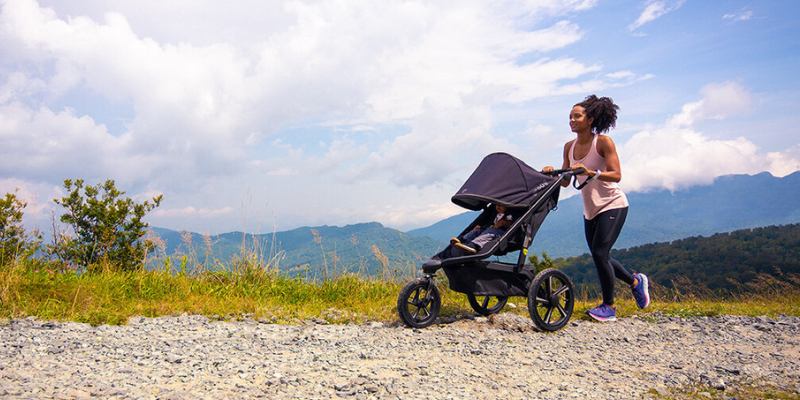 Woman jogging with BOB Alterrain Pro stroller