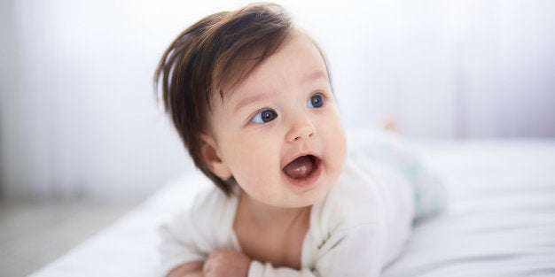 Baby smiling and awake