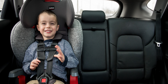 Little boy sitting in a Britax Car Seat