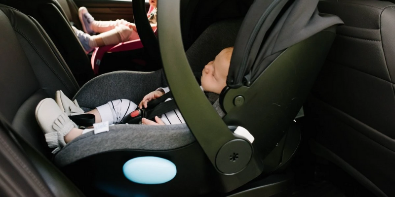 Baby asleep in Clek Liing infant car seat