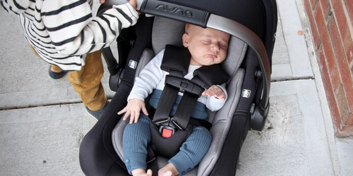 Baby sleeping in a Nuna PIPA Infant Car Seat