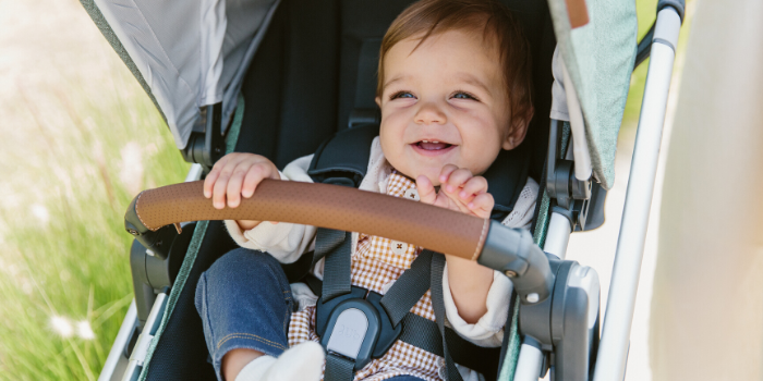 Smiling baby in an UPPAbaby Stroller