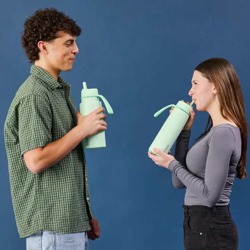 Insulated water bottle with flip top
