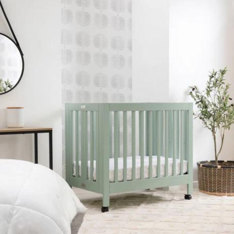 Origami Portable Mini Crib by Babyletto at $399! Shop now at Nestled by Snuggle Bugz for Cribs.