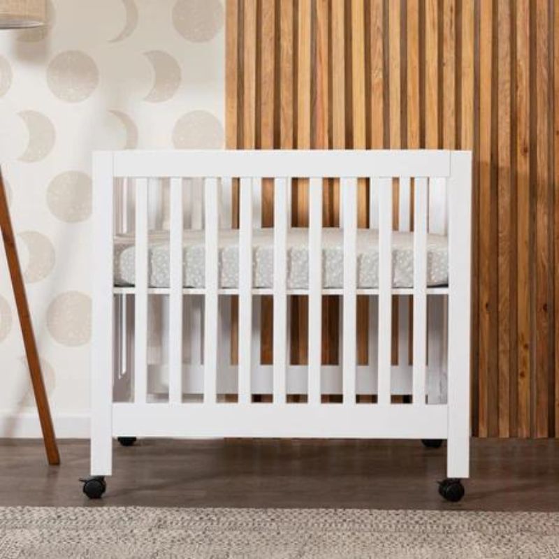 Origami Portable Mini Crib by Babyletto at $399! Shop now at Nestled by Snuggle Bugz for Cribs.