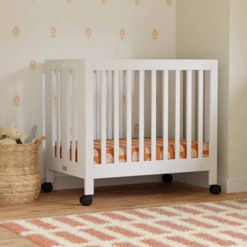 Origami Portable Mini Crib by Babyletto at $399! Shop now at Nestled by Snuggle Bugz for Cribs.