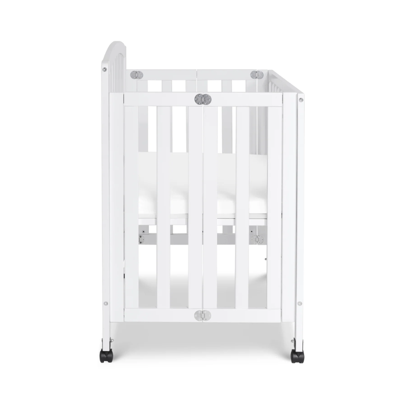 Dylan Folding Portable 3-in-1 Mini Crib by DaVinci at $299! Shop now at Nestled by Snuggle Bugz for Cribs.