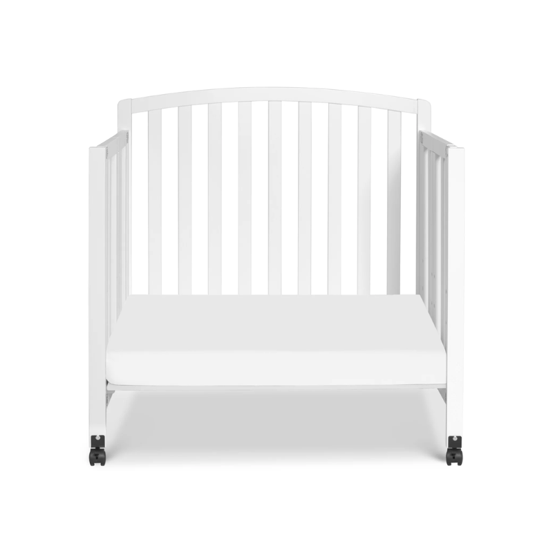 Dylan Folding Portable 3-in-1 Mini Crib by DaVinci at $299! Shop now at Nestled by Snuggle Bugz for Cribs.