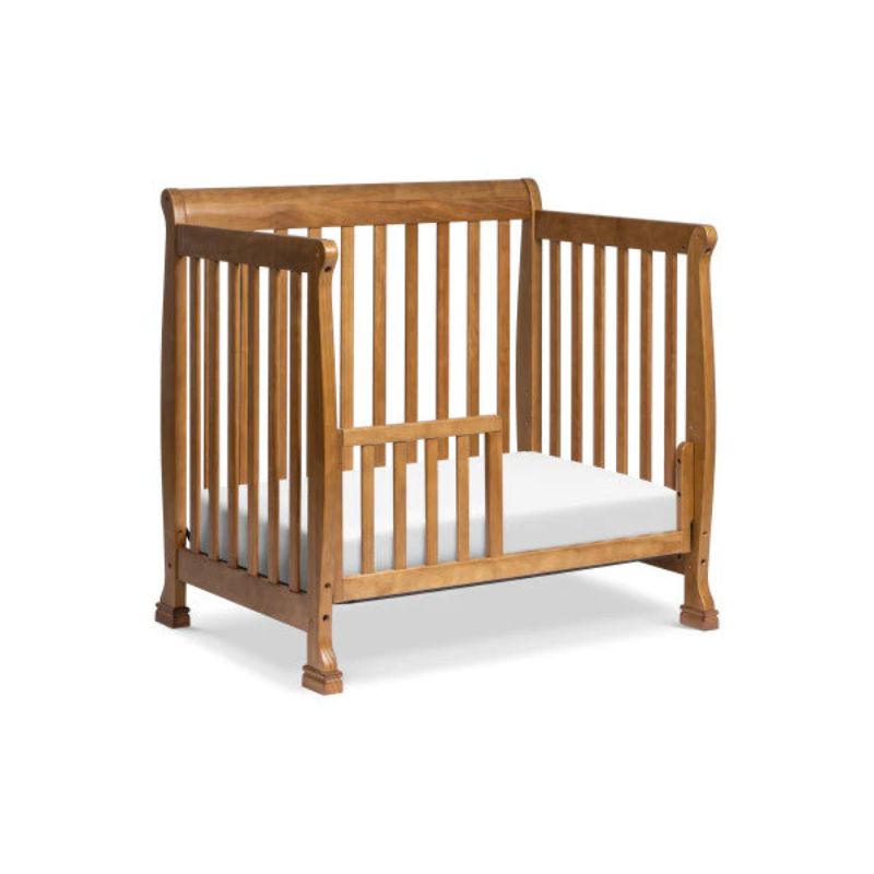 Kalani Mini Crib by DaVinci Baby at $299! Shop now at Nestled by Snuggle Bugz for Cribs.