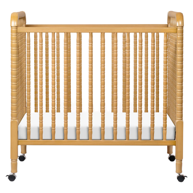 Jenny Lind Mini Crib by DaVinci Baby at $299! Shop now at Nestled by Snuggle Bugz for Cribs.