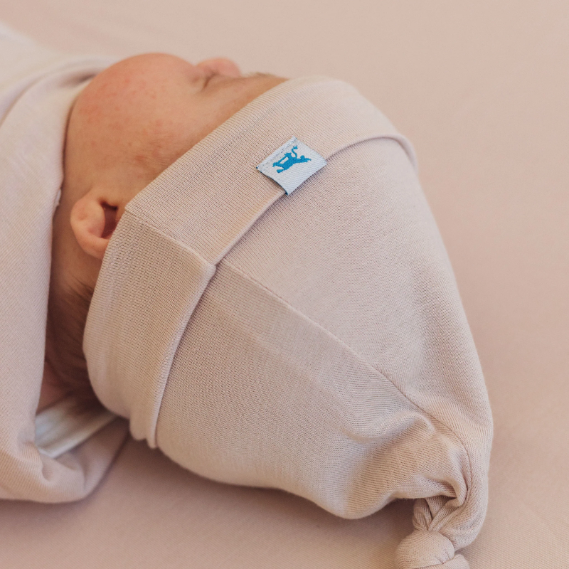 Stretch Knit Top Knot Hat