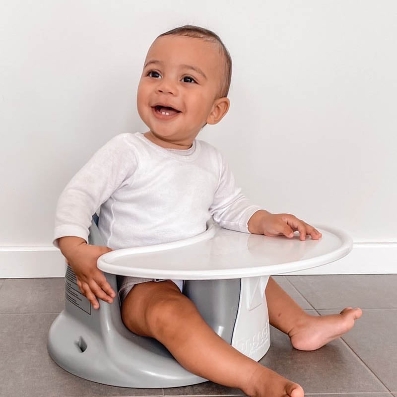 Infant booster seat store with tray